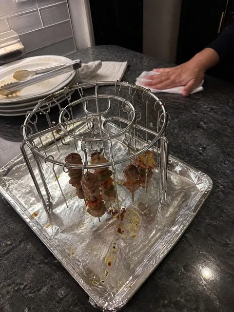 Hanging skewer rack cooling after dinner