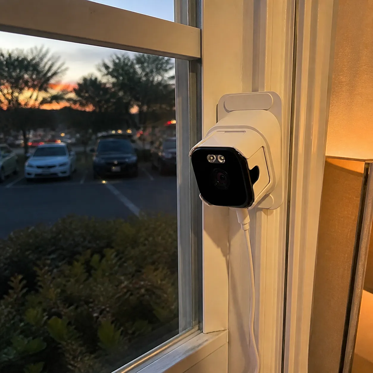 Camera on an apartment window at dusk
