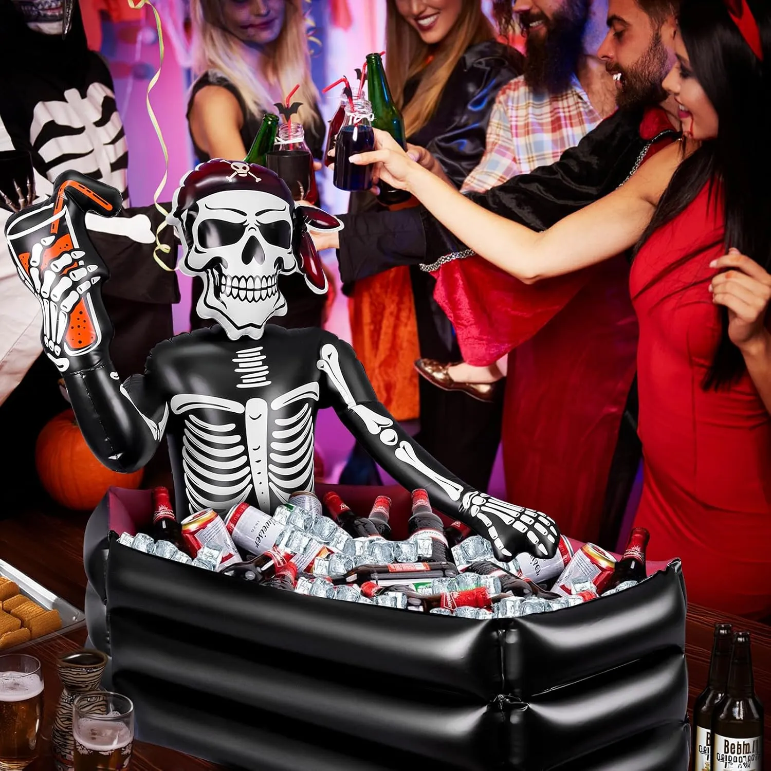 Inflatable pirate skeleton cooler serving drinks at an indoor Halloween party