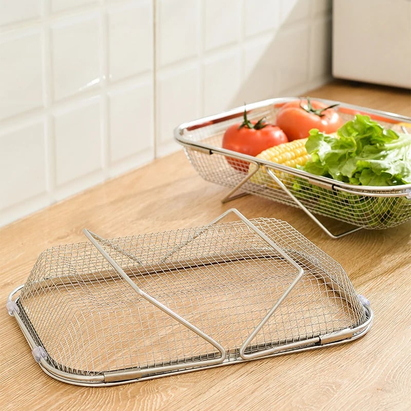 Foldable support feet on sink strainer basket