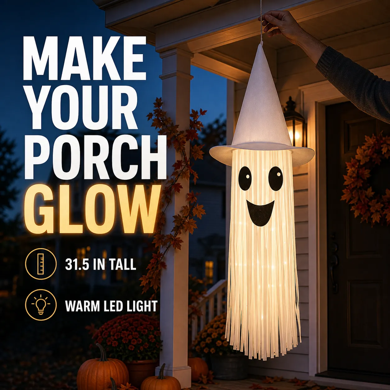 White light-up tassel ghost glowing on an American front porch