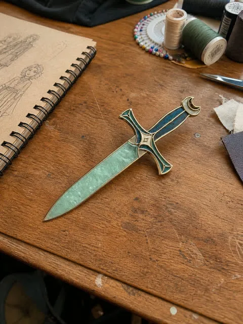 Mystic Green potion dagger on a casual costume-making desk