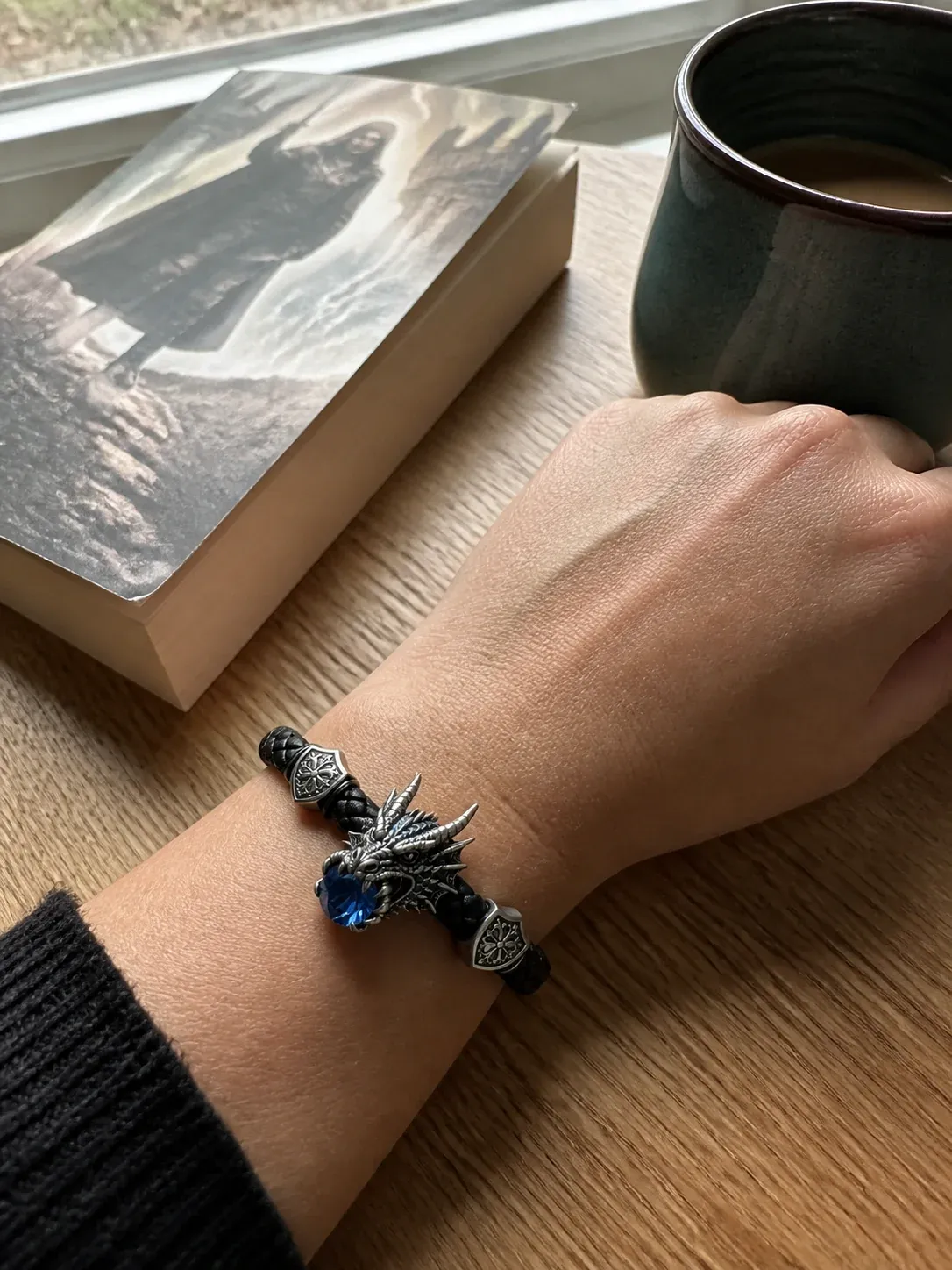 Ice Drake bracelet styled with a book and coffee