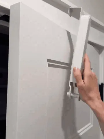 Foldable door rack opening, holding clothes, and folding away