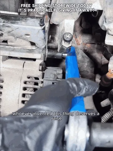 Offset extension wrench reaching a fastener inside an engine bay