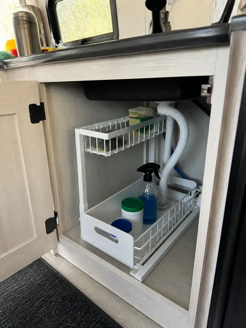White organizer neatly arranged in a bathroom vanity