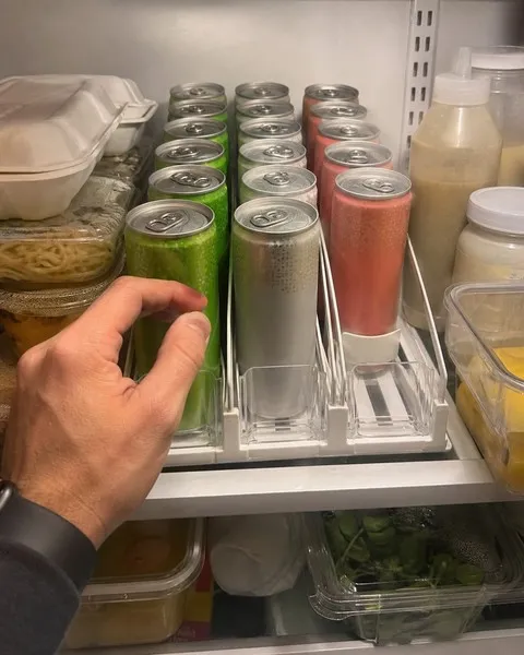 Three beverage rows in a home refrigerator