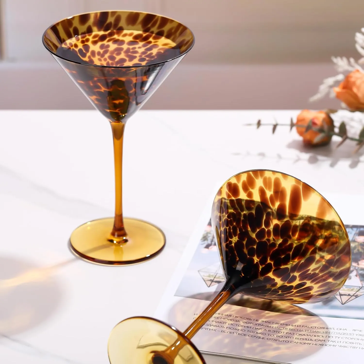 Close view of the amber and dark tortoiseshell pattern on martini glasses