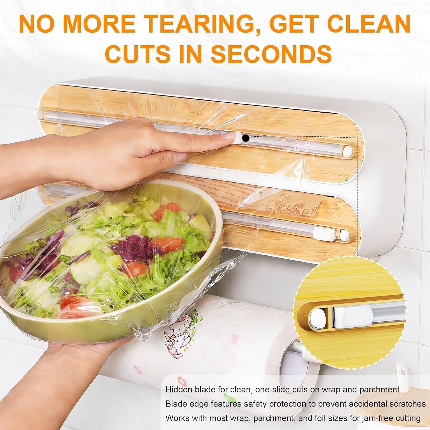 Sliding cutter making a straight cut through kitchen wrap