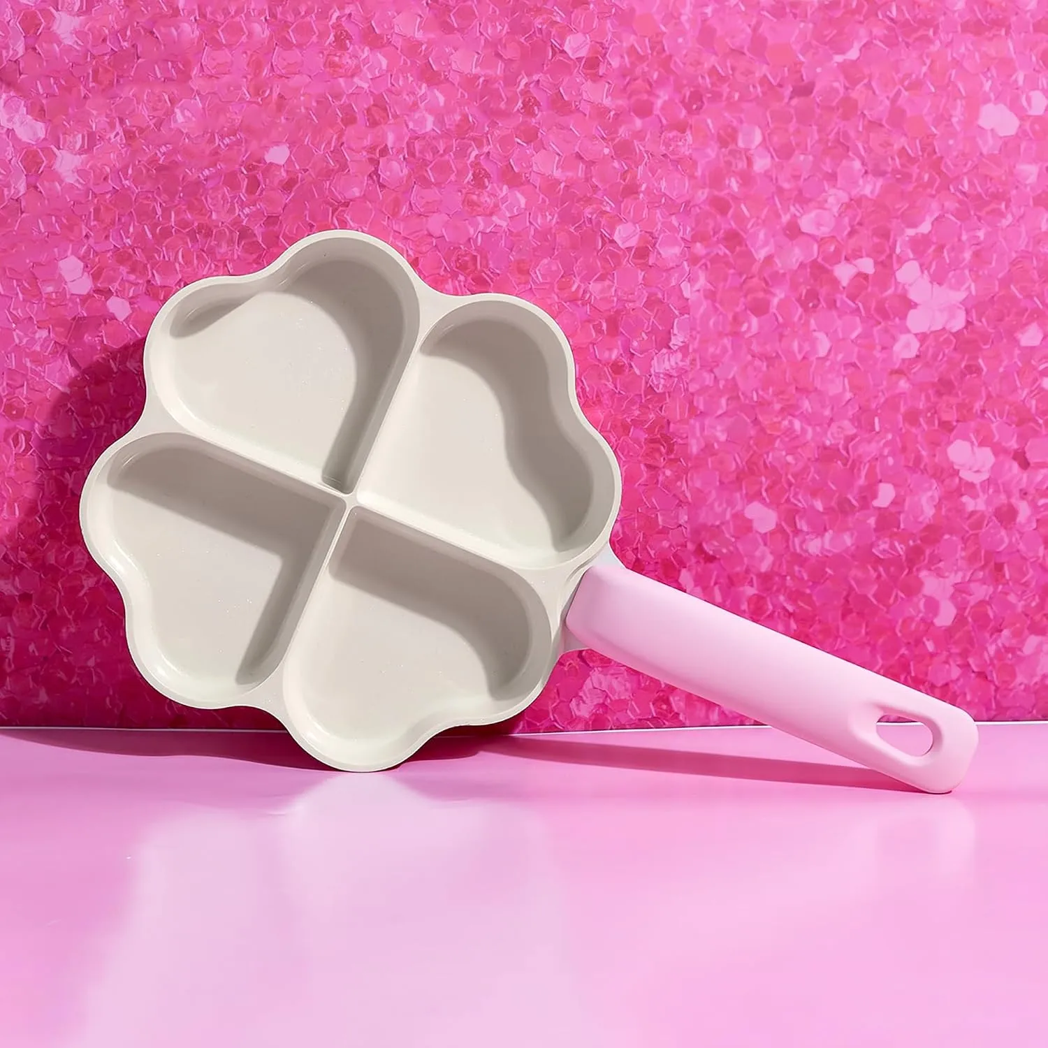 Pink four-heart breakfast pan in a cheerful kitchen setting