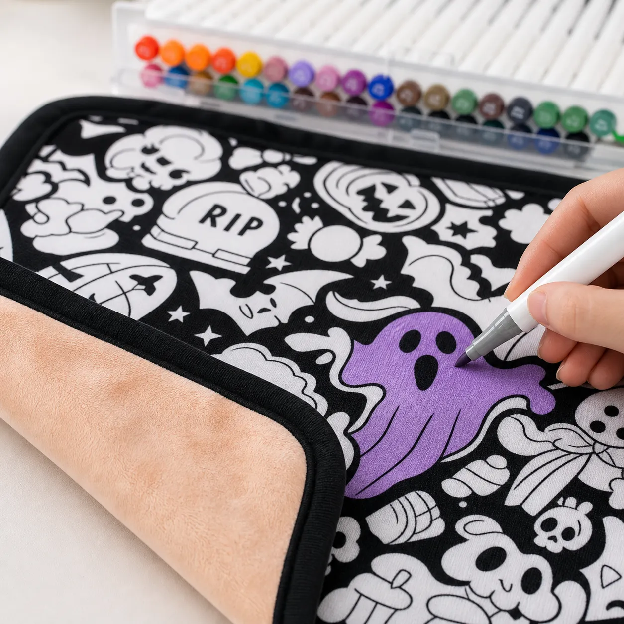 Close-up of coloring the Halloween blanket