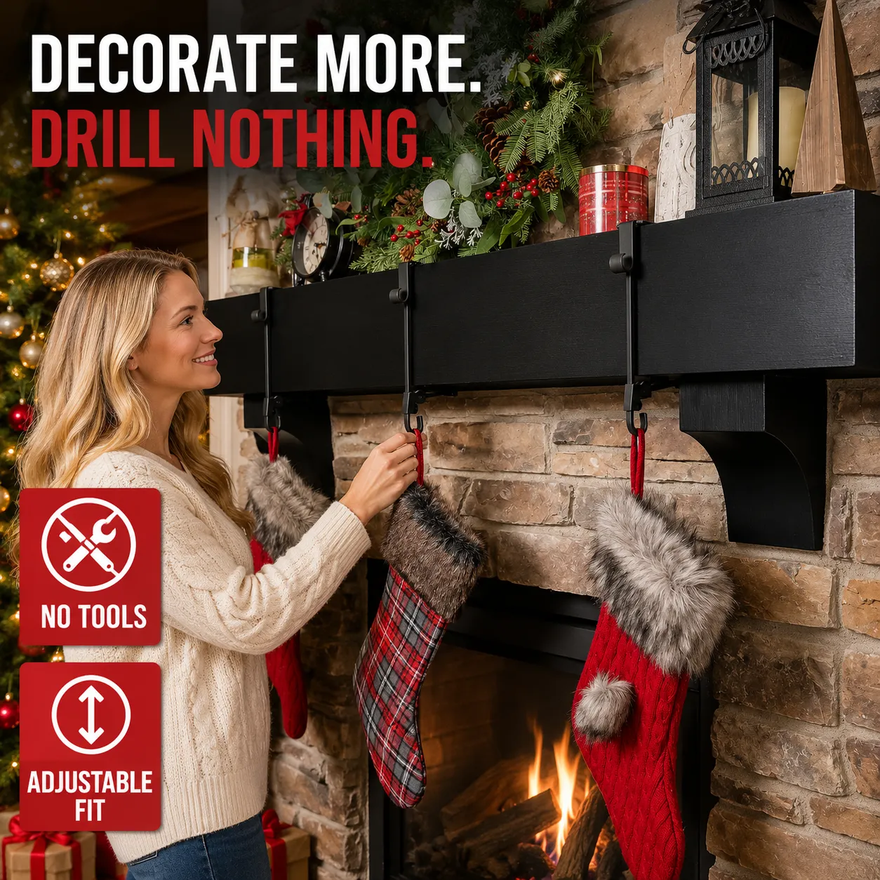 Black adjustable mantel hangers supporting garland and stockings