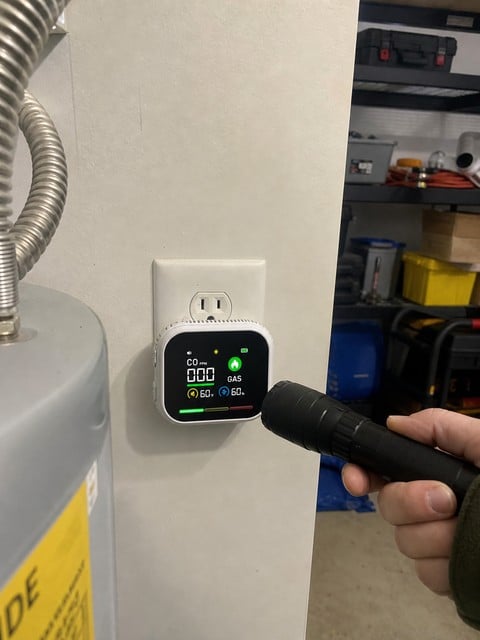 Monitor being checked in a garage utility area