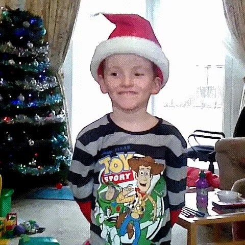 Close-up singing and dancing Santa hat animation