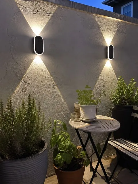 Outdoor solar wall lights in a customer's home setting