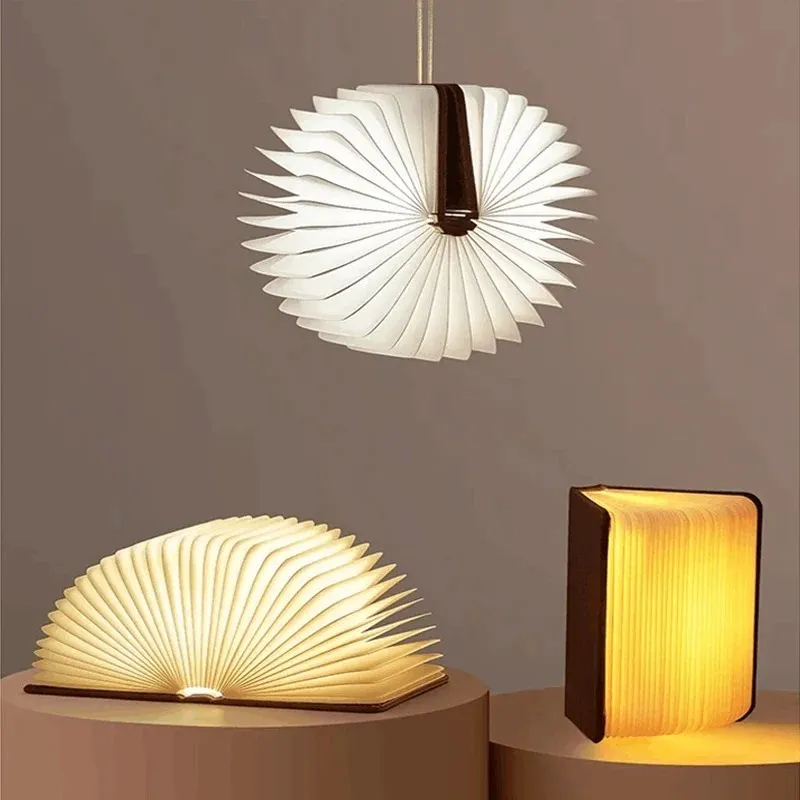 Folding book light arranged in several decorative display shapes