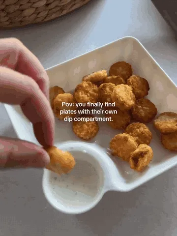 Food and dipping sauce served together in the attached cup