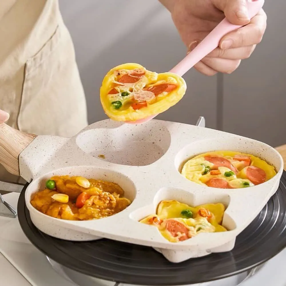 Cook serving a heart-shaped breakfast bite