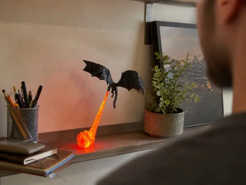 Red glow dragon decoration on a casual home office shelf
