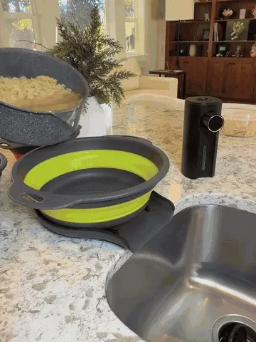 Collapsible colanders draining pasta and folding flat for storage