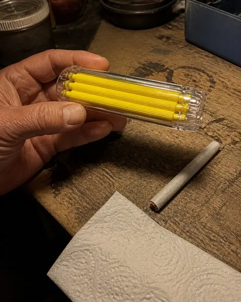 Closed yellow manual roller on a home workbench