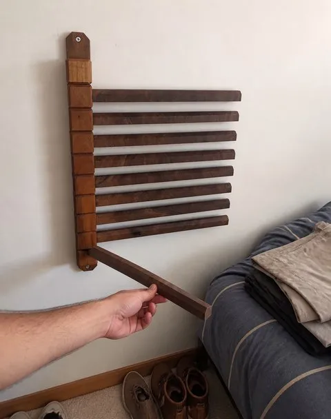 Wall-mounted wood rack in a lived-in bedroom