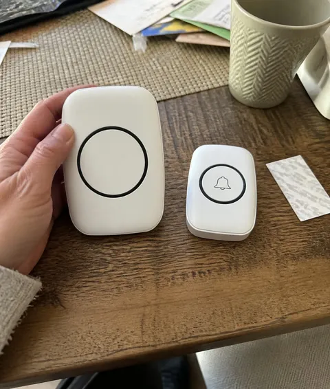 Wireless doorbell kit on a home table after setup
